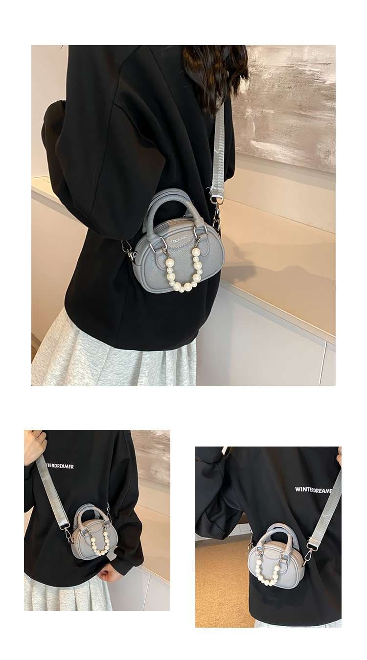 パールハンドル付きポシェット